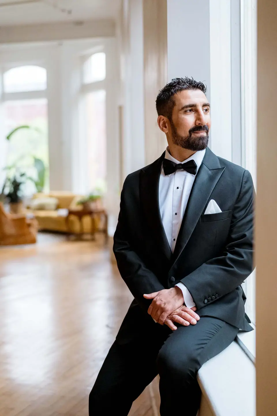 Groom portrait in natural window light
