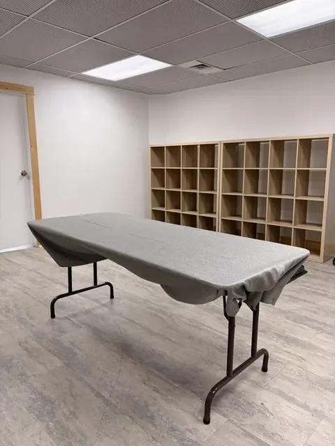 Three folding tables at The Harlow Exchange
