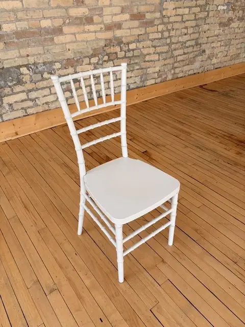 Eight white Chiavari chairs at The Harlow Exchange