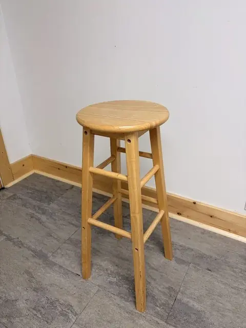 Wooden bar stool at The Harlow Exchange